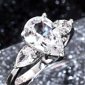 Flawless zirconia set in silver plated setting- NWT Size 8
